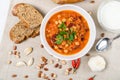 Chili Beans Stew, Bread, Red Chili Pepper And Garlic Royalty Free Stock Photo