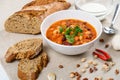 Chili Beans Stew, Bread, Red Chili Pepper And Garlic Royalty Free Stock Photo