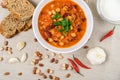 Chili Beans Stew, Bread, Red Chili Pepper And Garlic Royalty Free Stock Photo