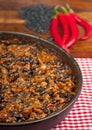 Chili con carne with black beans and red peppers Royalty Free Stock Photo