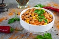 Chili con carne in a bowl. Mexican cuisine. Chili with meat, corn and beans