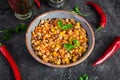 Chili con carne in a bowl. Mexican cuisine. Chili with meat, corn and beans