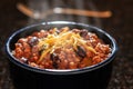 Chili con carne with cheese in a bowl Royalty Free Stock Photo