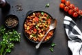 Chili con carne classic mexican dish on the kitchen table, top view