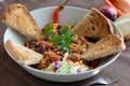 Chili con carne and fresh vegetables Royalty Free Stock Photo