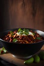 Chili con carne with meat and vegetables on a dark background Royalty Free Stock Photo