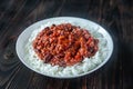 Chili con carne served with white rice