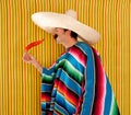 Chili hot pepper Mexican man typical poncho serape Royalty Free Stock Photo