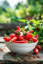 chili pepper in a bowl in a white bowl on a wooden table. Selective focus Royalty Free Stock Photo