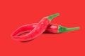 Chili pepper isolated on a red background with clipping path Royalty Free Stock Photo