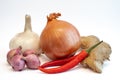 Chili pepper, onion , shallot, ginger and garlic isolated on white background. Royalty Free Stock Photo