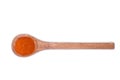 Chili pepper powder on wooden spoon isolated on white Royalty Free Stock Photo