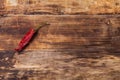 Chili pepper on wooden table