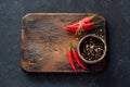 Chili peppers and assorted dry peppers Royalty Free Stock Photo