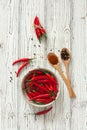 Chili peppers and assorted dry peppers Royalty Free Stock Photo