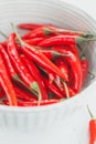 Chili peppers in a white ceramic bowl Royalty Free Stock Photo