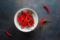 Chili peppers in a white ceramic bowl Royalty Free Stock Photo