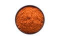 chili powder in clay bowl isolated on white background. Seasoning or spice top view Royalty Free Stock Photo