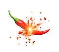 Chili powder and chili flakes burst out from red chili pepper Royalty Free Stock Photo