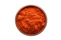 Chili powder spice in wooden bowl, isolated on white background. Seasoning top view Royalty Free Stock Photo