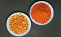 Chili, red pepper flakes and chili powder burst Royalty Free Stock Photo