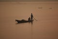 Fishing boat sailing at dawn through chilika lake Royalty Free Stock Photo