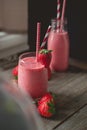 chill and relax time with strawberry smoothie with wood background and copy space