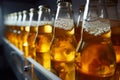 Chilled beer bottles, closeup, ready to cool with golden liquid in the fridge for the party