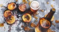 A chilled bottle of orange-flavored beer next to a sliced orange Royalty Free Stock Photo