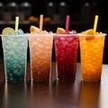 Chilled delight, row of icy fruit slushies, each in a plastic cup