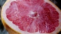 Chilled grapefruit macro texture with cold steam Royalty Free Stock Photo