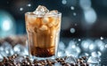 Chilled iced coffee in a clear glass amidst scattered coffee beans and ice cubes. Cold Brew - summer drinks.