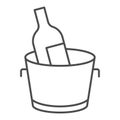 Chilled wine in bucket thin line icon. Alcohol drink bottle in ice cooler outline style pictogram on white background Royalty Free Stock Photo