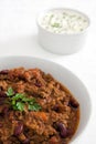 Chilli con carne with sour cream and chives Royalty Free Stock Photo