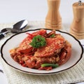 Chilli Mud Crab, Crab with Singaporean Sauce, Special Singapore Cuisine. Served on WHite Plate