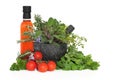 Chilli Oil, Herb Leaves and Tomatoes Royalty Free Stock Photo