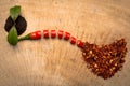 Chilli, Red pepper flakes and chilli powder. Royalty Free Stock Photo