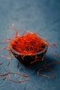 Chilli threads in small bowl on dark background Royalty Free Stock Photo