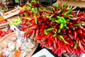 Chillies, red chilli pepper, on the traditional italian fruit, vegetable and spice market in Gallipoli town, Italy, Apulia region