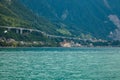 Chillon Castle. mountains and viaduct highway construction on the shores of Lake Geneva Lac Leman in Montreux Riviera, Vaud, Royalty Free Stock Photo