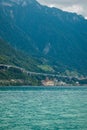 Chillon Castle. mountains and viaduct highway construction on the shores of Lake Geneva Lac Leman in Montreux Riviera, Vaud, Royalty Free Stock Photo