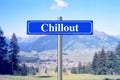 Chillout on blue street sign with landscape