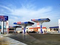 Chillout gas and oil station with a blue cloudy sky, a petrol gas station near Cairo airport with circle K stores