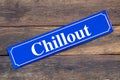 Chillout street sign on wooden background