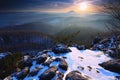 Chilly autumnal foggy weather bellow peak. Exposed sandstone rocks Royalty Free Stock Photo