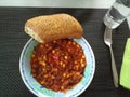 chilly con carne and a piece of bread