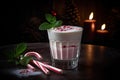 A chilly, peppermint-infused cocktail, featuring a creamy, white chocolate liqueur-based drink, served in a frosty glass with a
