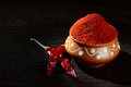 Chilly powder in clay pot with red chilly Royalty Free Stock Photo