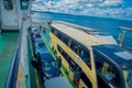 CHILOE, CHILE - SEPTEMBER, 27, 2018: Above view of cars inside of ferry and passengers for crossing from the Chilean Royalty Free Stock Photo