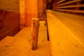 CHILOE, CHILE - SEPTEMBER, 27, 2018: Close up of selective focus of wooden stick inside of historic church of Nercon